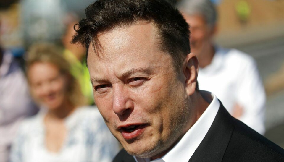 (FILES) In this file photo taken on September 3, 2020 Tesla CEO Elon Musk talks to media as he arrives to visit the construction site of the future US electric car giant Tesla, in Gruenheide near Berlin. - The court battle between Elon Musk and Twitter kicked off on July 19, 2022, as the social media firm tries to force the entrepreneur to honor their $44 billion buyout deal. The first hearing will center on Twitter's push to set a trial date for as early as September in a case that has massive stakes for both parties. (Photo by Odd ANDERSEN / AFP)