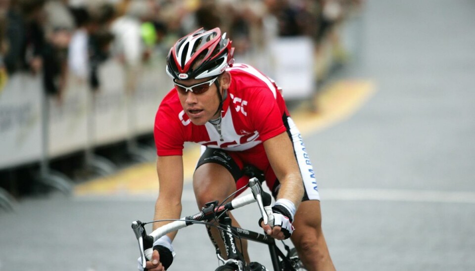 Michael Blaudzun ses her i dannebrogstrøjen. Han har vundet tre danmarksmesterskaber i enkeltstart (2001, 2003 og 2005) og to i landevejscykling (1994 og 2004).