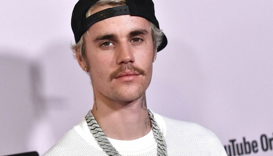 Justin Bieber har fået Ramsay Hunts-syndrom, som gør ham lam i den ene side af ansigtet. (Arkivfoto).