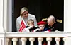 Fyrstinde Charlene og fyrst Albert ses her på palads-balkonen sammen med tvillingerne prinsesse Gabriella og prins Jacques på nationaldagen i 2019.
