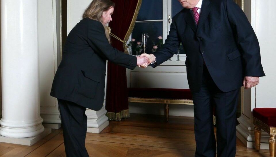 Magne Lunde hilser på kong Harald i forbindelse med, at han den 20. november 2012 modtog Kongens Fortjensmedalje i sølv for sit lange virke i norsk musik.