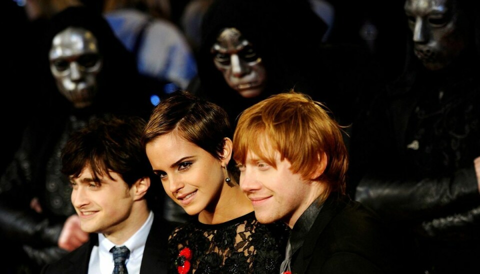 Daniel Radcliffe (til venstre), Emma Watson (i midten) og Rupert Grint (til højre) ses her i forbindelse med premieren på den næstsidste Harry Potter-film i november 2010 (Arkivfoto).