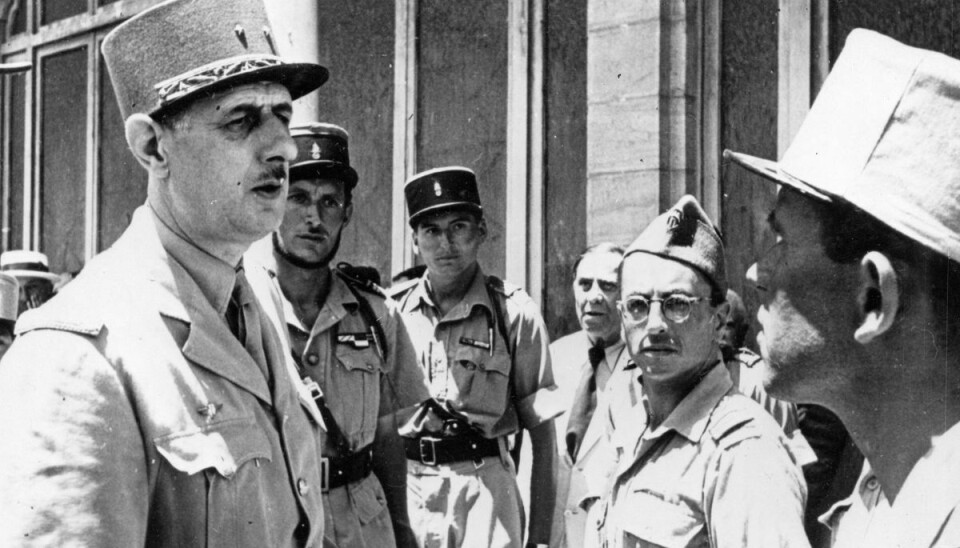 Hubert Germain (bagerst i midten) ses sammen med den daværende leder af de frie franske styrker, Charles de Gaulle, under Anden Verdenskrig i Tunesien i 1943. (Arkivfoto)