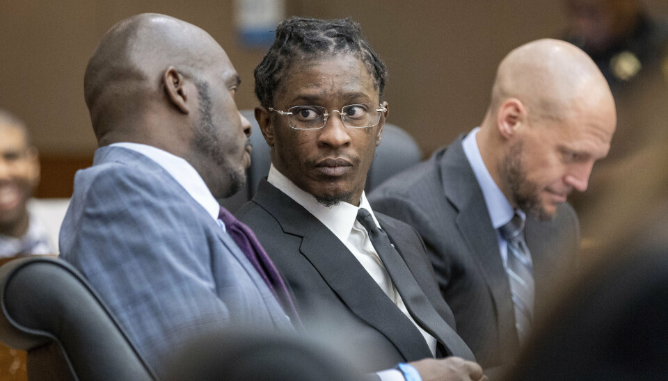 Young Thug (i midten) har været anklager for handlinger begået som del af gruppen Young Slime Life.