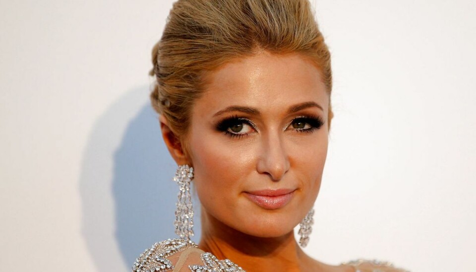 Paris Hilton, 40-årig arving til Hotel Hilton formuen, maner nu alle rygter om graviditet i jorden. Foto: Scanpix/STEPHANE MAHE/Ritzau