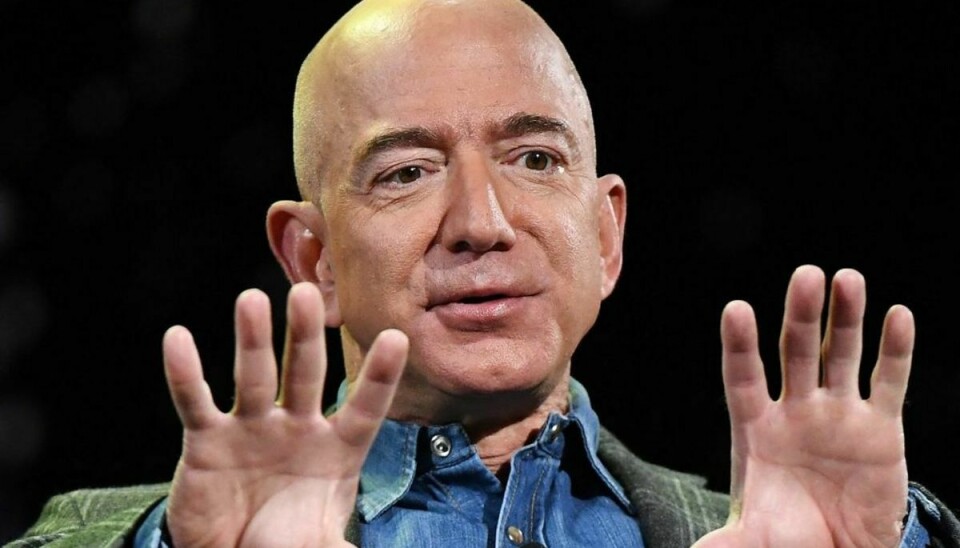 Bezos har udtalt, at han vil bruge mere tid på andre af sine investeringer – herunder avisen Washington Post og rumselskabet Blue Origin. Foto: Mark RALSTON / AFP