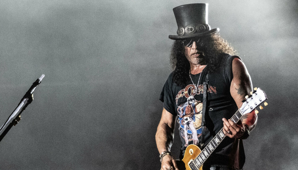 Guitaristen Slash fra Guns N' Roses på Copenhell i 2023. Slash blev medlem af bandet i 1985, hvor han var 20 år. Den 23. juli fylder han 60 år og er stadig en del af rockbandet.
