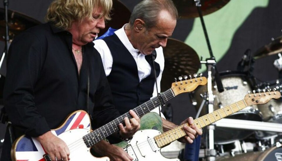 Status Quo-guitarist indlagt på hospitalet Rick Parfitt (t.v.) er indlagt efter mistanke om et hjertetilfælde. Foto: LUKE MACGREGOR/Scanpix (Arkivfoto)
