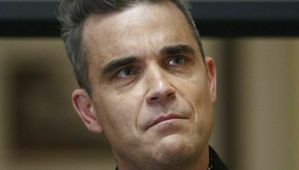 42-årige Robbie Williams giver til sommer koncert i Telia Parken i København. Foto: PETER NICHOLLS/Scanpix.
