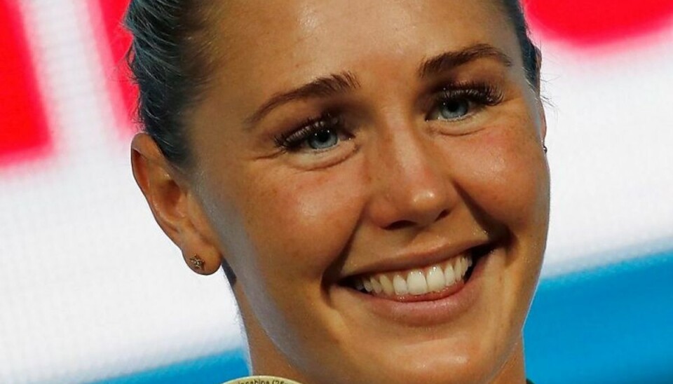 Jeanette Ottesen kan fejre et flot jubilæum, efter at hun natten til lørdags dansk tid vandt guld ved kortbane-VM i 50 meter butterfly. Foto: Gregory Shamus/Scanpix.