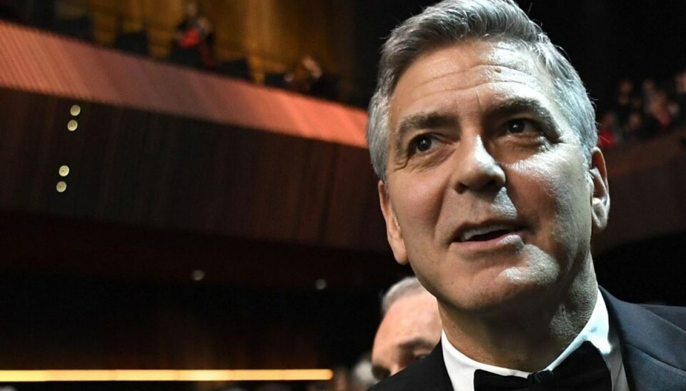 Rørende billede: Se George Clooney på plejehjemsbesøg George Clooney er en mand med et enormt overskud. Foto: Scanpix/Bertrand Guay