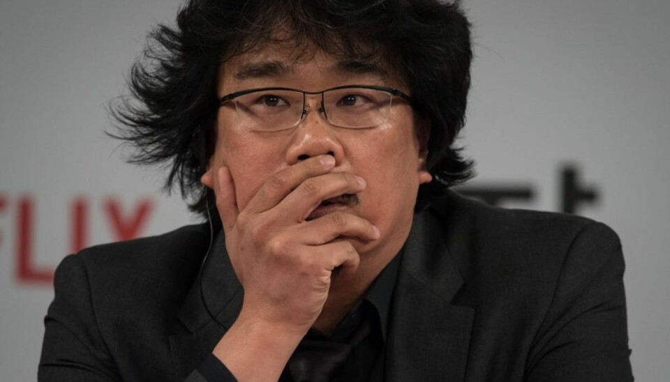 Publikum i Cannes stopper film fra Netflix med buhen Den sydkoreanske instruktør Bong Joon-jo er med sin film “Okja”, produceret af Netflix, kommet i strid modvind på filmfestivalen i Cannes. Foto: Scanpix/Ed Jones