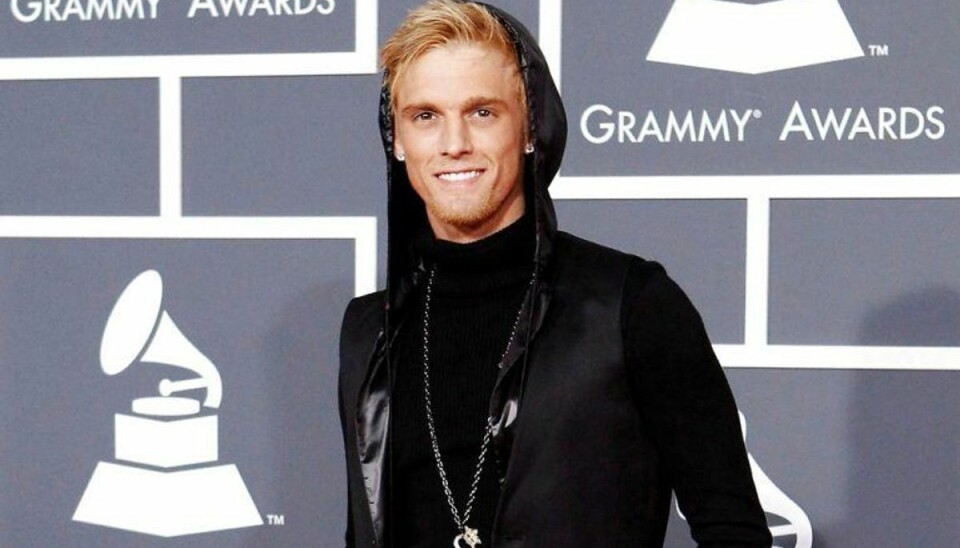 Kendt popstjerne snuppet med stoffer Aaron Carter er blevet snuppet af politiet. I bilen sad også hans kæreste. Hun røg med ind. Foto: Mario Anzuoni/Scanpix.