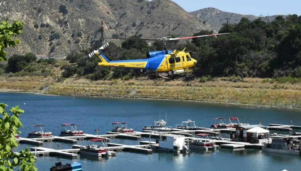 Eftersøgningen af den forsvundne skuespiller Naya Rivera blev søndag udvidet til at gælde hytter og udhuse omkring Lake Piru. KLIK VIDERE OG SE FLERE BILLEDER. Foto: Robyn Beck / AFP Eftersøgningen af den forsvundne skuespiller Naya Rivera blev søndag udvidet til at gælde hytter og udhuse omkring Lake Piru. KLIK VIDERE OG SE FLERE BILLEDER. Foto: Robyn Beck / AFP