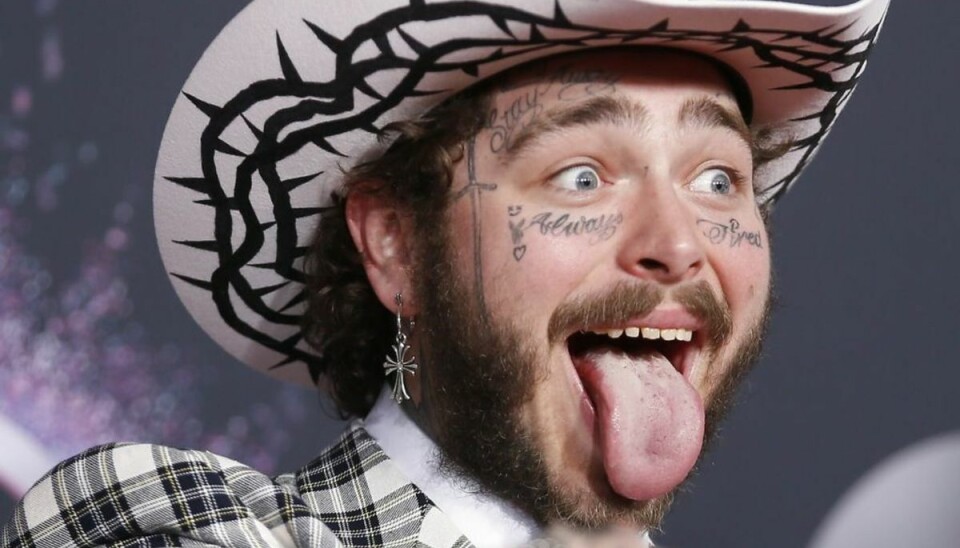 Foto: Danny Moloshok / SCANPIX Post Malone er bare helt vild med beer pong.Foto: Danny Moloshok / SCANPIX