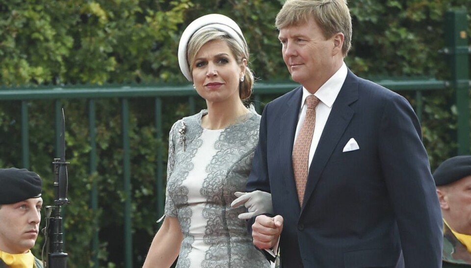 Det Hollandske kongepar, kong Willem-Alexander og dronning Maxima. Klik videre for at se billeder fra de voldsomme uroligheder. Foto: Scanpix/REUTERS/John Thys/Pool